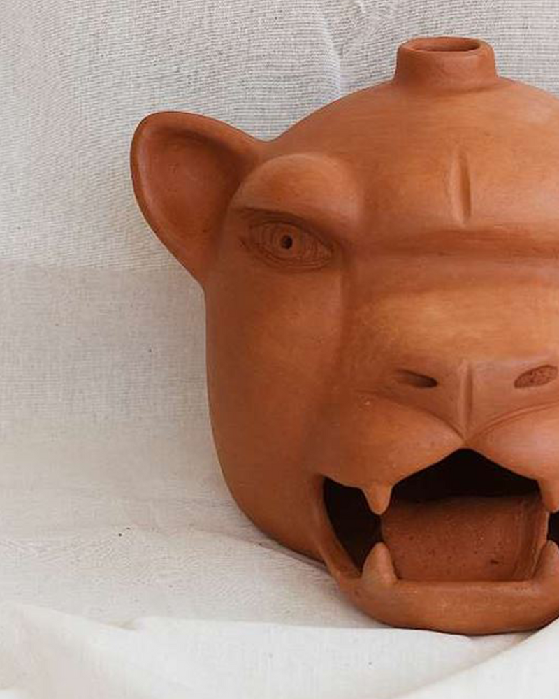 Candelabro cabeza de jaguar