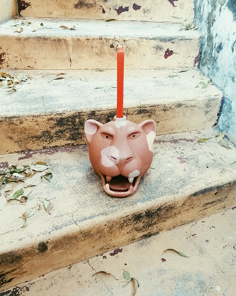 Candelabro cabeza de jaguar